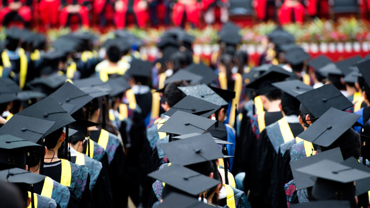 graduation image, illustrating the university case study on data unification and how it increased productivity and customer satisfaction with a unified customer database