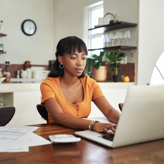 woman working remotely at home, continuing contact center operations