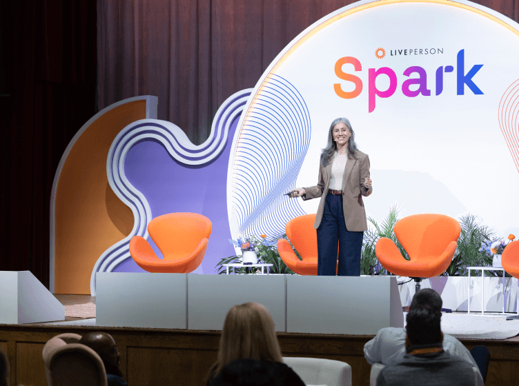 CMO Ruth Zive at a Spark keynote, sharing her experiences with needing a connected customer experience