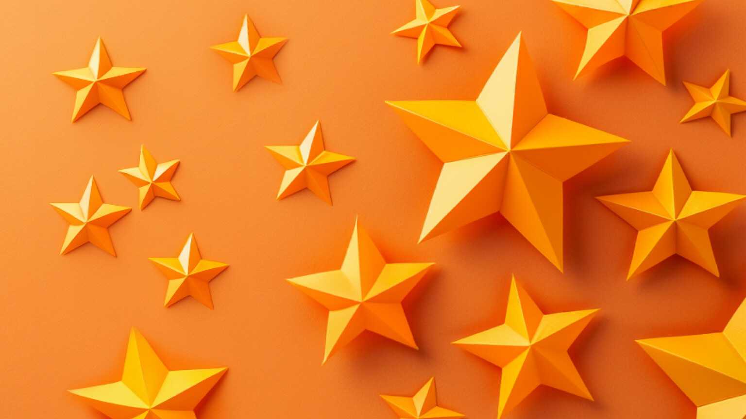 Stars on orange background, representing how an ai maturity model can help you reach the stars
